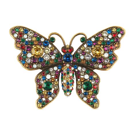 gucci butterfly brooch.